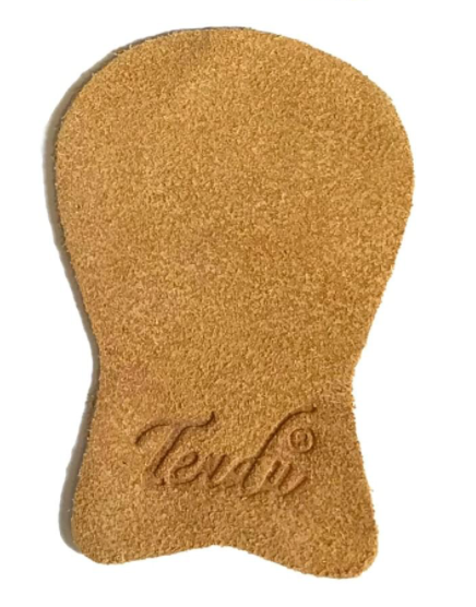 Tendu suede pointe protector.